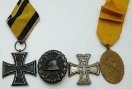 WWI German medals comprising Iron Cross, replica Iron Cross,
