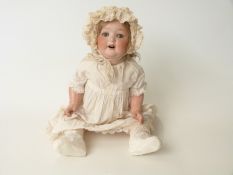 Heubach Koppelsdorf bisque headed doll with open mouth, weighted blue eyes,