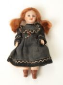 Society Francaise de Fabrication de Bebes et Jouets (SFBJ) miniature bisque headed doll with closed
