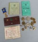A collection of military badges to include Gloucestershire, RASC, Devonshire,