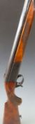 Baikal 12 bore single barrel shotgun with chequered semi-pistol grip and forend,