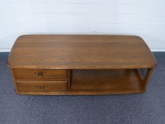 Ercol elm coffee table with two drawers below,