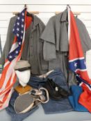 A collection of American Civil War reenactment uniforms and equipment including shirt, overcoat,