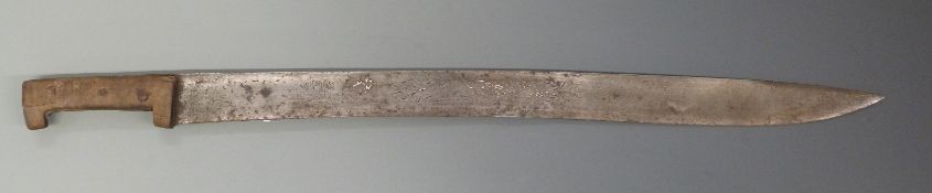 African machete / short sword of simple construction with wooden handle and crude engraving to