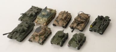 Nine Corgi Toys diecast model military vehicles including tanks,