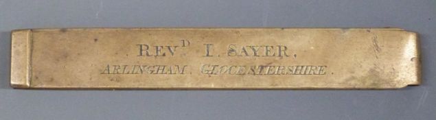 A 19thC brass double sided spring loaded percussion cap loading tool marked Reverend I.