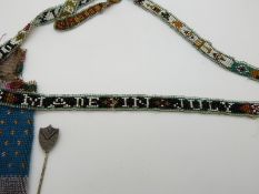 An unusual Victorian beadwork sash or necklace with script 'A present to Mr James Chambers by