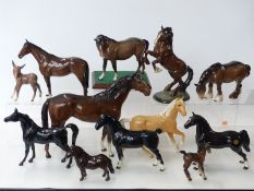 Twelve Beswick / John Beswick figures including horses, foal,
