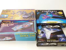 Four vintage sci-fi related toys/games comprising Blue-Box Batman Batwing,
