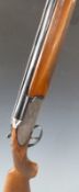 Armitalia 12 bore over and under ejector shotgun with scenes of birds and a stag to the side locks