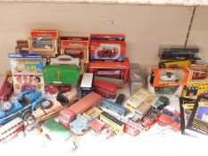 Fifty-six Corgi, Dinky, Spot-On, Britains, Rio, ERTL, Matchbox and similar diecast model vehicles,