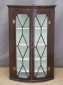19thC mahogany bow fronted corner cupboard,