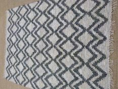 An unused Berber leather rug 170 x 240cm
