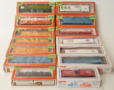 Fourteen Life-Like Trains and Lionel HO/00 gauge wagons and box cars,