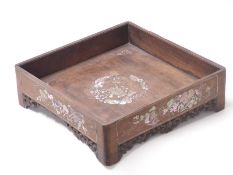 A late 19thC Chinese hardwood stand with mother of pearl inlay depicting rats,