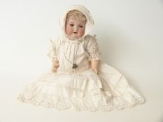 Armand Marseille bisque headed doll with open mouth, weighted brown eyes,