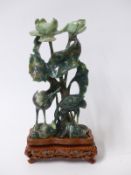 Japanese hardstone carving depicting cranes & lily pads on hardwood stand and in box,