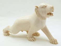 An early 20thC ivory lion