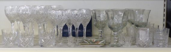 A large collection of drinking glasses including cut examples