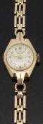 J W Benson 9ct gold ladies wristwatch with gold hands and Arabic numerals,