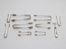 Three pairs of Georgian and later hallmarked silver sugar tongs, weight 95g,