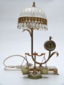 A combination clock lamp with drop lustre shade,