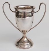 Late Victorian or early 20thC hallmarked silver twin handled trophy cup, London, date letter rubbed,