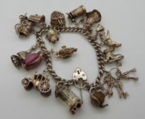 A hallmarked silver charm bracelet with over 16 charms