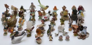 A large collection of ceramic birds including Royal Worcester,