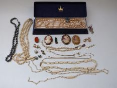 A collection of costume jewellery including a section of a Victorian ring,