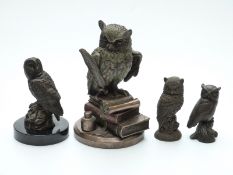 Four bronzed owls,