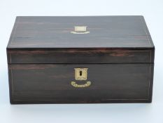 Coromandel wood writing slope with secret drawers,