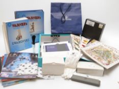 A collection of Swarovski Crystal books and accessories