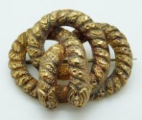 Victorian yellow metal knot brooch with a textured surface, 8.2g, 4 x 3.