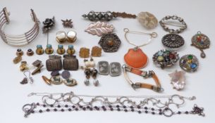 Three silver brooches including one set with synthetic cats eye chrysoberyl, micro mosaic,