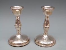 Pair of modern hallmarked silver candlesticks, Birmingham 1969 maker W I Broadway & Co, 10.