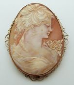 A 9ct gold brooch set with a large shell cameo depicting a young women, 6.