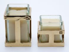 David Marshall (b1942) two brass and aluminium square candle holders,