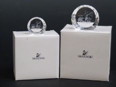 A pair of Swarovski Crystal cut glass signed special event paperweights Pierrot,