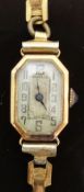 Ladies 18ct gold wristwatch with blued hands, Arabic numerals,
