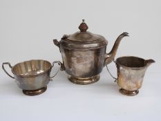 George VI hallmarked silver three piece teaset, Birmingham 1938, maker's mark Adie Brothers,