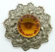 Scottish kilt pin / brooch decorated with thistles and set with a large orange stone