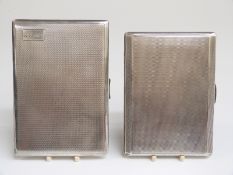 Two engine timed hallmarked silver cigarette case with engine turned decoration, both Birmingham,