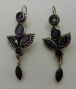 A pair of silver earrings