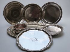 Six silver plated trays and salvers, length of largest 57cm,