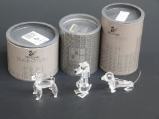 Three Swarovski Crystal Dogs, Poodle, Dachshund and Pluto Standing Dog, largest 6.
