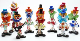 A collection of Murano glass clowns,