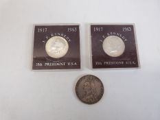 Queen Victoria 1887 double florin together with two 1965 commemorative Kennedy half dollars