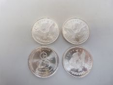 Four silver trade unit USA one ounce coins