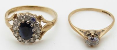 A 9ct gold ring set with a sapphire and another 9ct gold ring